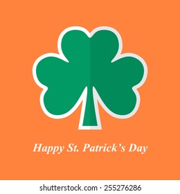 Symbol of St. Patrick's Day clover leaf with shadow on orange background. Vector illustration