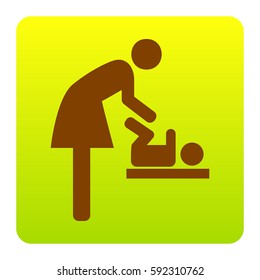 Symbol for women and baby, baby changing. Vector. Brown icon at green-yellow gradient square with rounded corners on white background. Isolated.