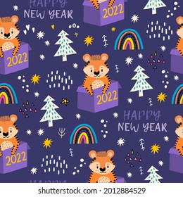 Símbolo del año 2022. Patrón sin foco con tigres y regalos, estrellas, arcos de lluvia. Papel para niños con tigres para decorar ropa, telas, papel pintado, cuadernos. Estilo Doodle.