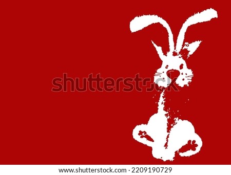 Symbol of the year 2023. Template for New Year, Christmas greeting card. Silhouette of a rabbit isolated on a red background with a copy space. White silhouette bunny, hare, rabbit. Vector
