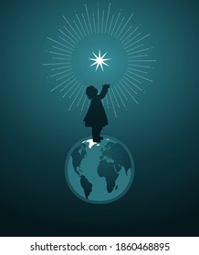 Symbolic Christmas image of a girl's silhouette, over the world, reaching for a star