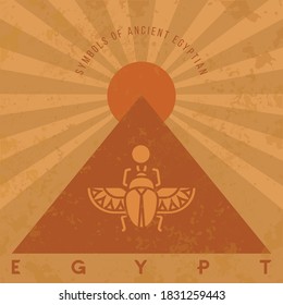 Symbols of ancient Egypt in an old style. Scarab beetle, pyramid and sun. Vector illustration. EPS 10.