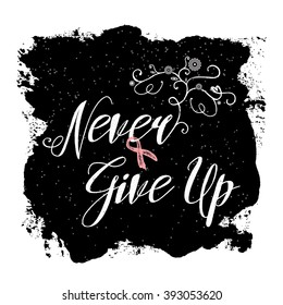 Symbols of breast cancer awareness. Pink ribbon in brush strokes, calligraphy of Never Give Up.  Hand drawn lettering and pink ribbon. Hand painted grunge texture background.