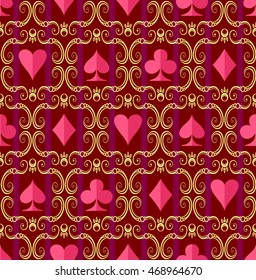 Symbols of playing cards on purple background. Seamless pattern.