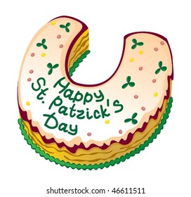 Symbols of  St.Patrick's Day: cake in the shape of a horseshoe.