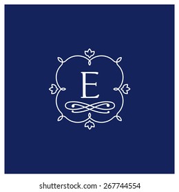 symmetric monogram. Contains elements sheets, lines, spirals, intersection circle point. In the center of the letter E.