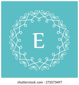 symmetric monogram. Contains elements sheets, lines, spirals, intersection circle point. In the center of the letter E.