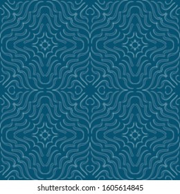 Symmetrical blue ethnic curl graphical motif. Indigo blue brush stroke ink. Seamless repeat vector pattern tile.