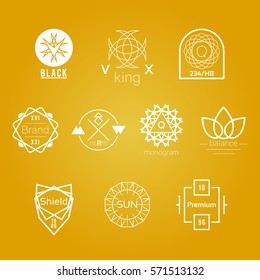 Symmetrical Geometric White Vector Badges Logos Set