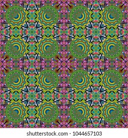 Symmetrical layout. Colorful ethnic patterned background in orange, green and blue colors. Seamless abstract vector geometric pattern. Bed sheets and interior. Gift wrapping paper.