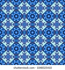 Symmetrical layout. Seamless abstract vector geometric pattern. Gift wrapping paper. Bed sheets and interior. Colorful ethnic patterned background in black, blue and violet colors.