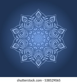 Symmetrical openwork ornament on a blue background with a radial gradient