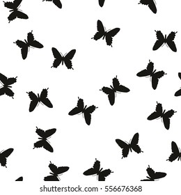 Symmetrical pattern of random butterflies black on white. Suitable for festive and celebratory decoration