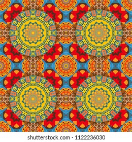 Symmetrical tile design in yellow, orange and blue colors. Oriental tiles, vector seamless islamic pattern with pretty oriental curves and mandalas details.