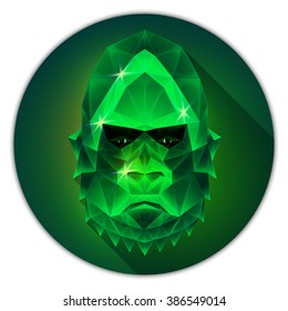 Symmetrical vector icon of a gorilla monkey. Made in low poly triangular style. Emerald gemstone imitation.
