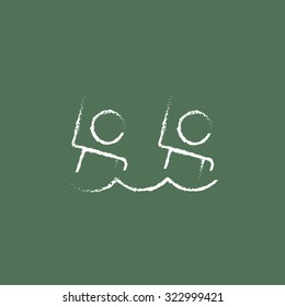 Synchronized swimming hand drawn in chalk on a blackboard vector white icon isolated on a green background.