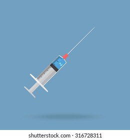 Syringe with blue liquid