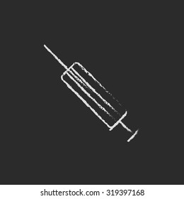 Syringe hand drawn in chalk on a blackboard vector white icon isolated on a black background.