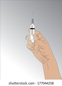 syringe in hand on background gray colors