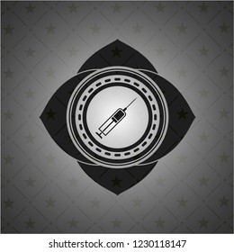 syringe icon inside black emblem