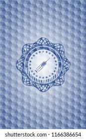 syringe icon inside blue badge with geometric pattern.