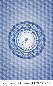 syringe icon inside blue emblem or badge with abstract geometric pattern background.