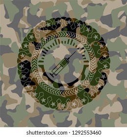 syringe icon inside camouflaged emblem