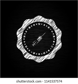 syringe icon inside chalk emblem