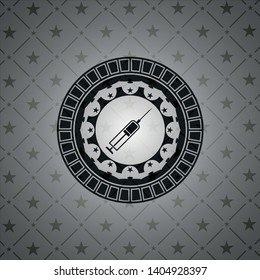 syringe icon inside dark badge