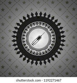 syringe icon inside dark emblem