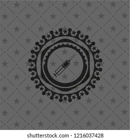 syringe icon inside dark emblem