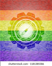 syringe icon inside emblem on mosaic background with the colors of the LGBT flag