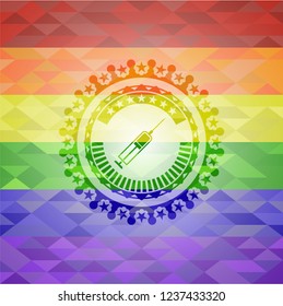 syringe icon inside emblem on mosaic background with the colors of the LGBT flag