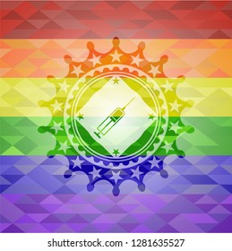 syringe icon inside emblem on mosaic background with the colors of the LGBT flag