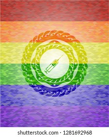 syringe icon inside emblem on mosaic background with the colors of the LGBT flag