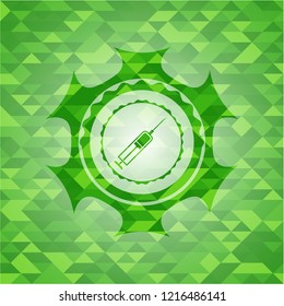 syringe icon inside green emblem with mosaic ecological style background