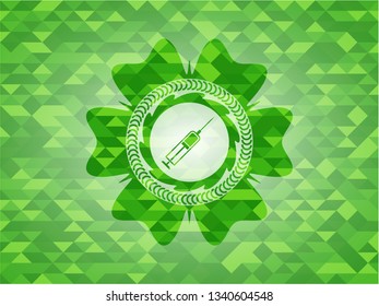 syringe icon inside green emblem with mosaic ecological style background