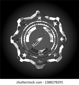 syringe icon inside grey camo texture