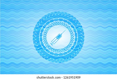 syringe icon inside light blue water badge.