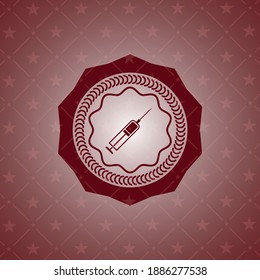 icono de la jeringa dentro de un emblema rojo realista. 