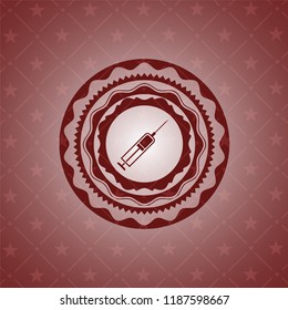 syringe icon inside red emblem