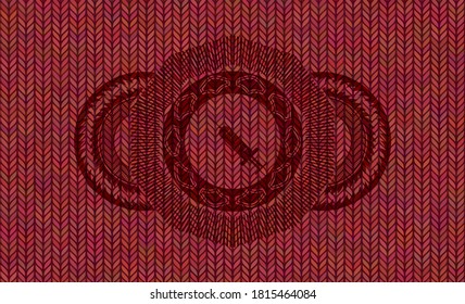 Syringe icon inside Red wool badge. Cloth chic background. Intense illustration. 