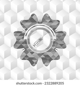 icono de la jeringa dentro del emblema gris estilo retro con fondo blanco cubo geométrico. 