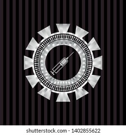 syringe icon inside silver shiny emblem