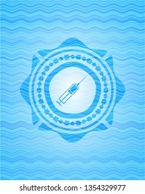 syringe icon inside water concept style badge.