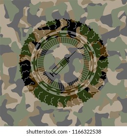 syringe icon on camo pattern