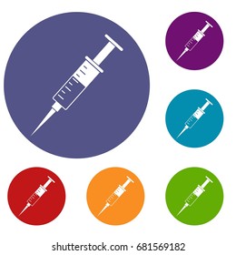 Syringe icons set in flat circle red, blue and green color for web