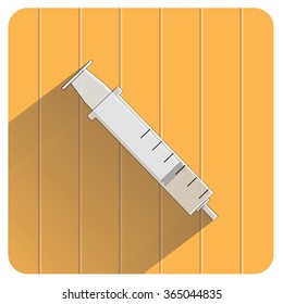 syringe on wood background vector