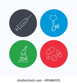 Syringe, stethoscope and microscope icons.