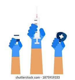 The syringe and vaccines bottle  held by hand of healthcare provider.
